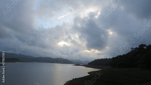 landscape with lake and cloudy sky