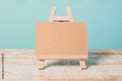 empty blank canvas on wooden easel isolated