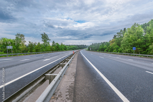 View of the new highway at cloudy summer morning.