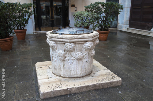 Historic Stone Well in Venice, Italy