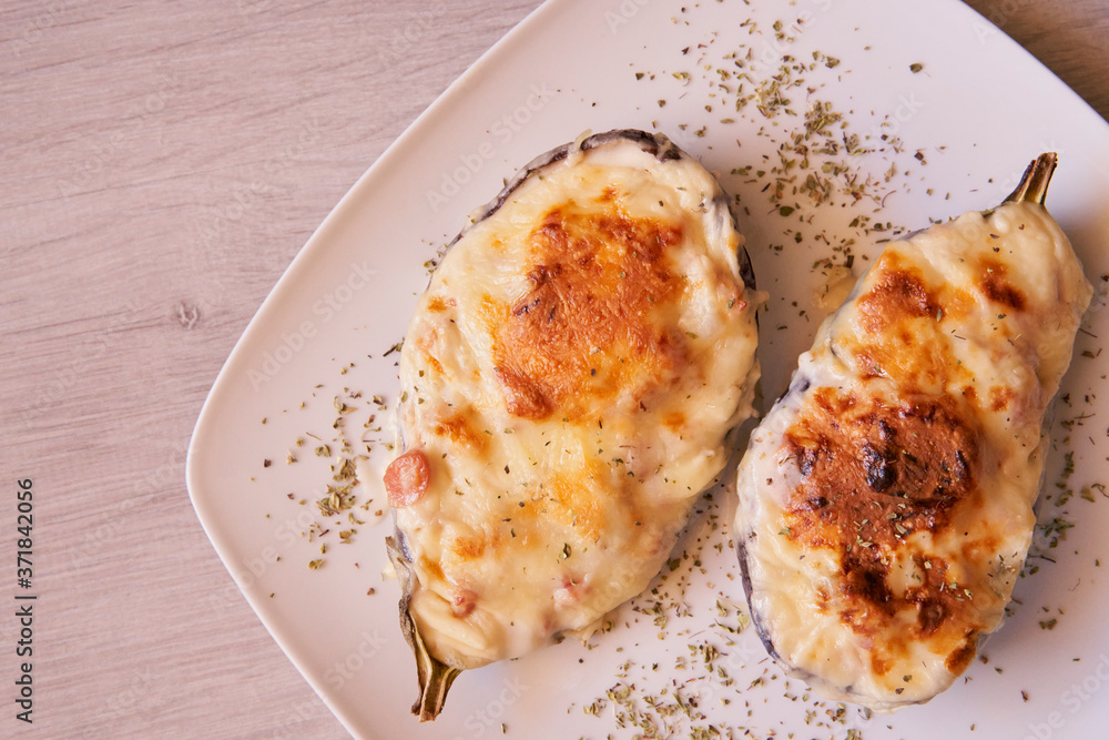 Aubergines stuffed with bacon, tuna, ham, cheese and bechamel Aubergines stuffed with bacon, tuna, ham, cheese and bechamel