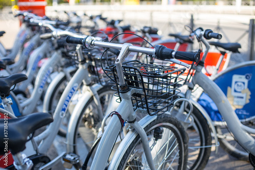 Bicycles for sale or rent in the city street in the summer