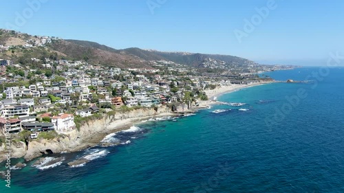 Aerial view of Laguna Beach coastline town with wealthy villas on the cliff, Southern California Coastline, USA
