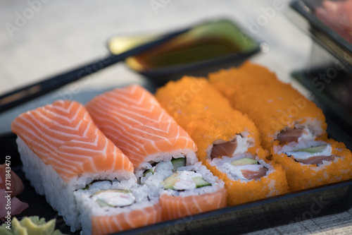 Orange sushi with salmon