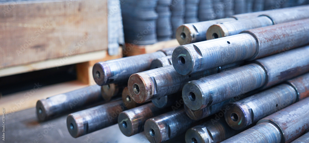 Factory for the manufacture of metal parts, pipes, spares close up Factory for the manufacture of metal parts, pipes, spares close up