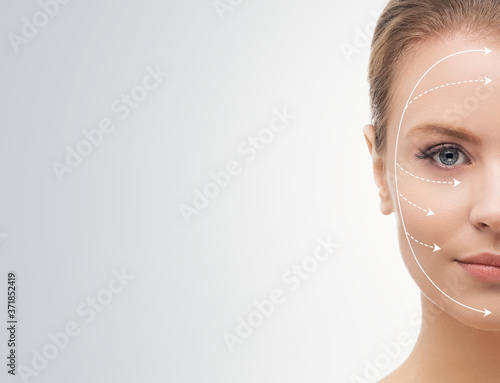 Obraz na plátně Young, beautiful and healthy woman with arrows on her face