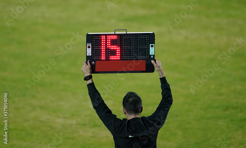 Football Referee announces change of players