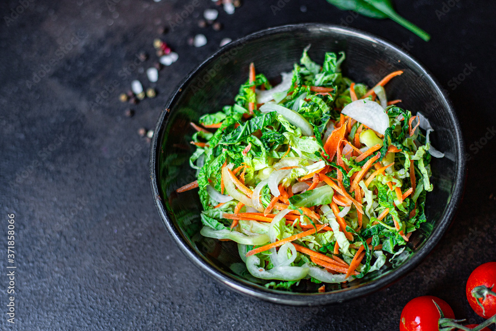 vegetables salad snack Peking savoy cabbage, onions, carrots, peppers and other vegetarian serving portion size natural product top view place for text copy space keto or paleo diet raw vegetables salad snack Peking savoy cabbage, onions, carrots, peppers and other vegetarian serving portion size natural product top view place for text copy space keto or paleo diet raw