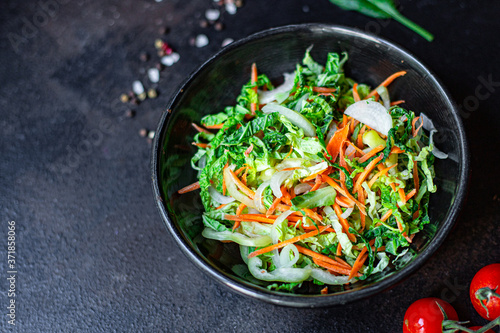 vegetables salad snack Peking savoy cabbage, onions, carrots, peppers and other vegetarian serving portion size natural product top view place for text copy space keto or paleo diet raw