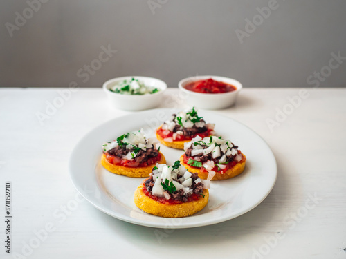 Sopes also known as Picadita, Traditional Mexican Dish Originating in the central and southern parts of Mexico That Looks like an Unusually Thick Tortilla with Toppings