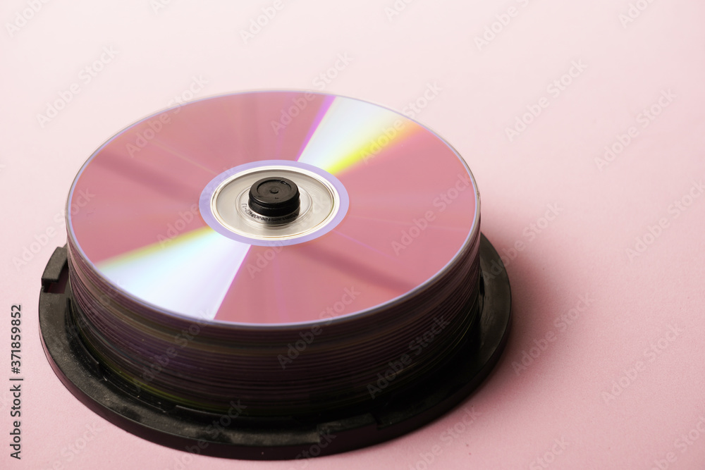 cd rooms or dvd tower on pink background flat lay cd rooms or dvd tower on pink background flat lay