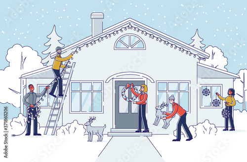 People decorating house and garden for christmas and new year holidays outside