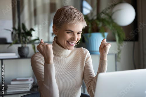 Wallpaper Mural Emotional overjoyed 30s young blonde businesswoman looking at computer screen, celebrating professional achievement, getting job promotion or salary raising notification, success luck concept. Torontodigital.ca