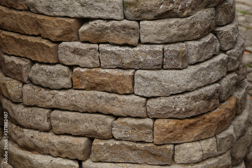 Gray stone wall made of natural stone