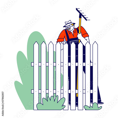 Senior Neighbor Character Wear Overalls and Panama Hat with Rake in Hands Stand at Fence with Sullen Face Expression