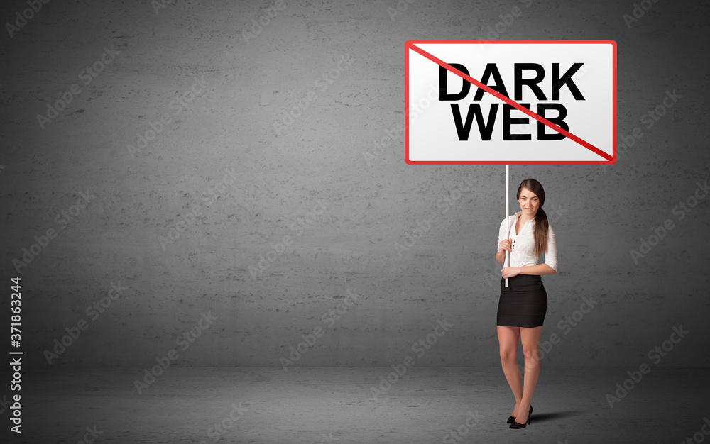 business person holding a traffic sign with DARK WEB inscription, new idea concept business person holding a traffic sign with DARK WEB inscription, new idea concept