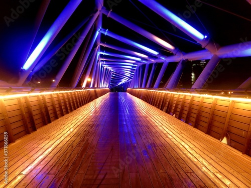 A lighted bridge at night