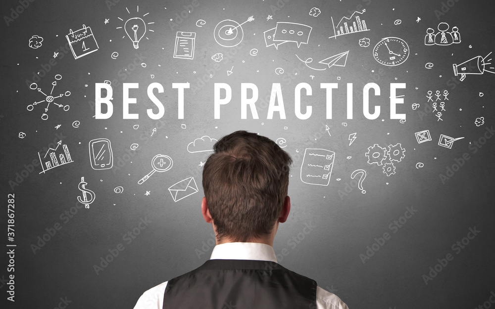 Rear view of a businessman with BEST PRACTICE inscription, modern business concept Rear view of a businessman with BEST PRACTICE inscription, modern business concept
