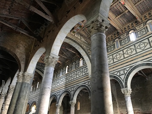 Florence, Tuscany, Italy - 07/14/2018: Basilica of San Miniato al Monte and the cemetery adjacent to the church. The place of rest of the author of 