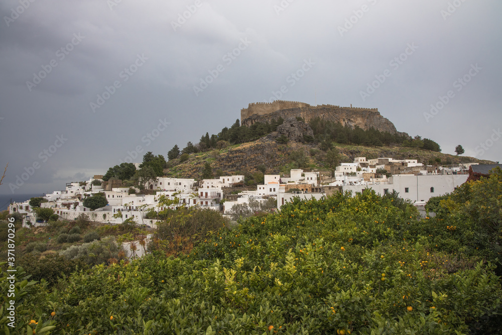 Obraz premium Lindos Acropolis and Lindos Village, Rhodes, Greece