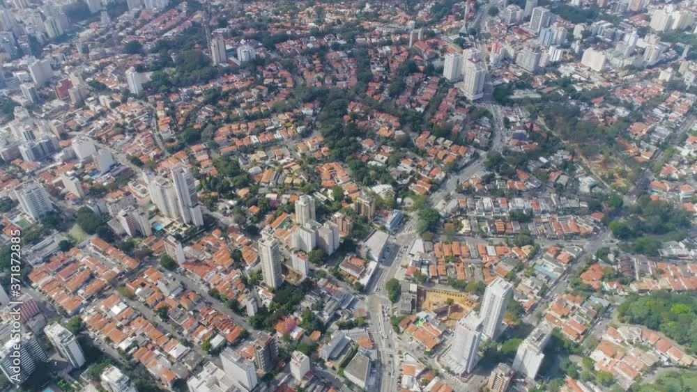 top down aerial view tracking above the buildings of Sao Paulo shot in 4K. Sao Paulo. Brazil.
top down aerial view tracking above the buildings of Sao Paulo shot in 4K. Sao Paulo. Brazil.