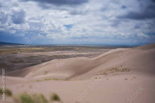 Sand dunes landscape using a tilt-shift lens giving miniature effect