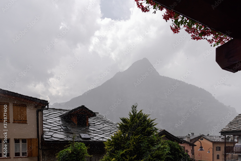 Roof of Courmayeur houses with a view of Mont Blanc - Valle d'Aosta - Italy