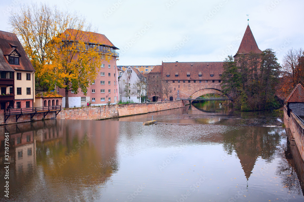 Nuremberg Schlayerturm and Pegnitz river . Autumn season in german old town Nuremberg Schlayerturm and Pegnitz river . Autumn season in german old town