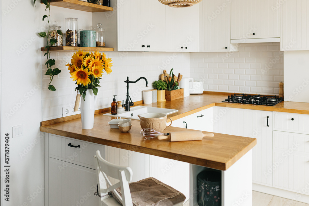 Fototapeta premium Dishes and utensils on kitchen table, ready to cook.