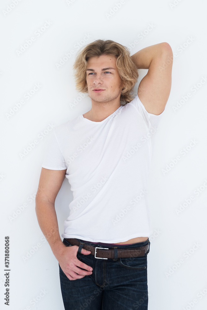young handsome man wearing casual posing in studio young handsome man wearing casual posing in studio