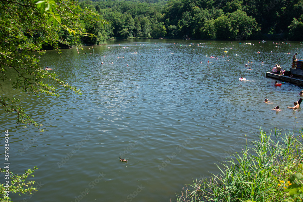 Romania 2020, People enjoying the sunshine on a hot summer day at the Bear Lake Thermal Spa in Sovata, Transylvania, Romania 2020, People enjoying the sunshine on a hot summer day at the Bear Lake Thermal Spa in Sovata, Transylvania,