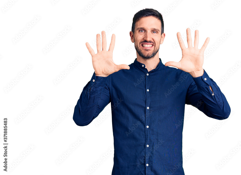 Young handsome man wearing casual shirt showing and pointing up with fingers number ten while smiling confident and happy. Young handsome man wearing casual shirt showing and pointing up with fingers number ten while smiling confident and happy.