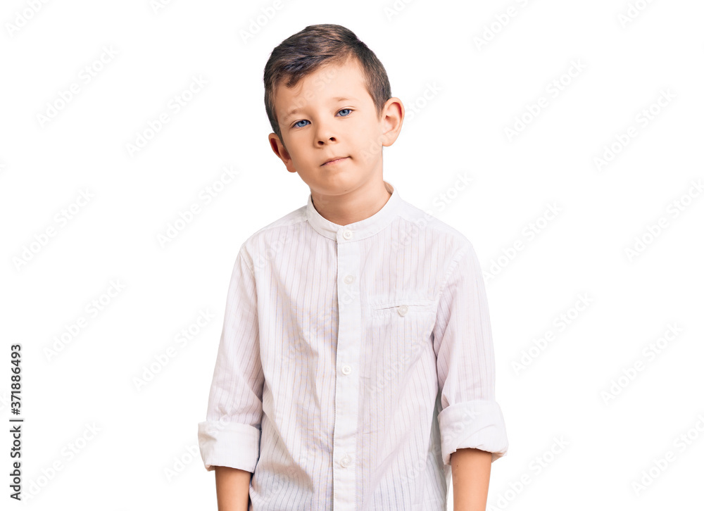Cute blond kid wearing elegant shirt looking sleepy and tired, exhausted for fatigue and hangover, lazy eyes in the morning. Cute blond kid wearing elegant shirt looking sleepy and tired, exhausted for fatigue and hangover, lazy eyes in the morning.