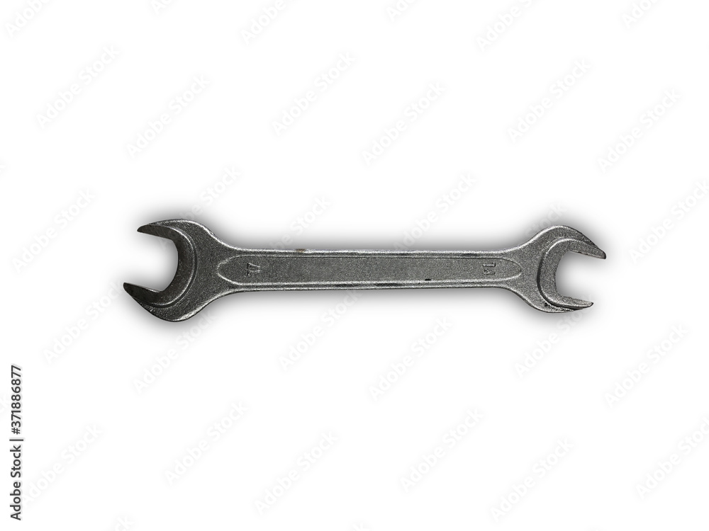 Close-up direct high angle view of a wrench spanner from a German automobile tool set with the standard sizes of 14 mm and 17 mm Close-up direct high angle view of a wrench spanner from a German automobile tool set with the standard sizes of 14 mm and 17 mm