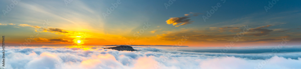 Panorama white fog cloud with sunrise