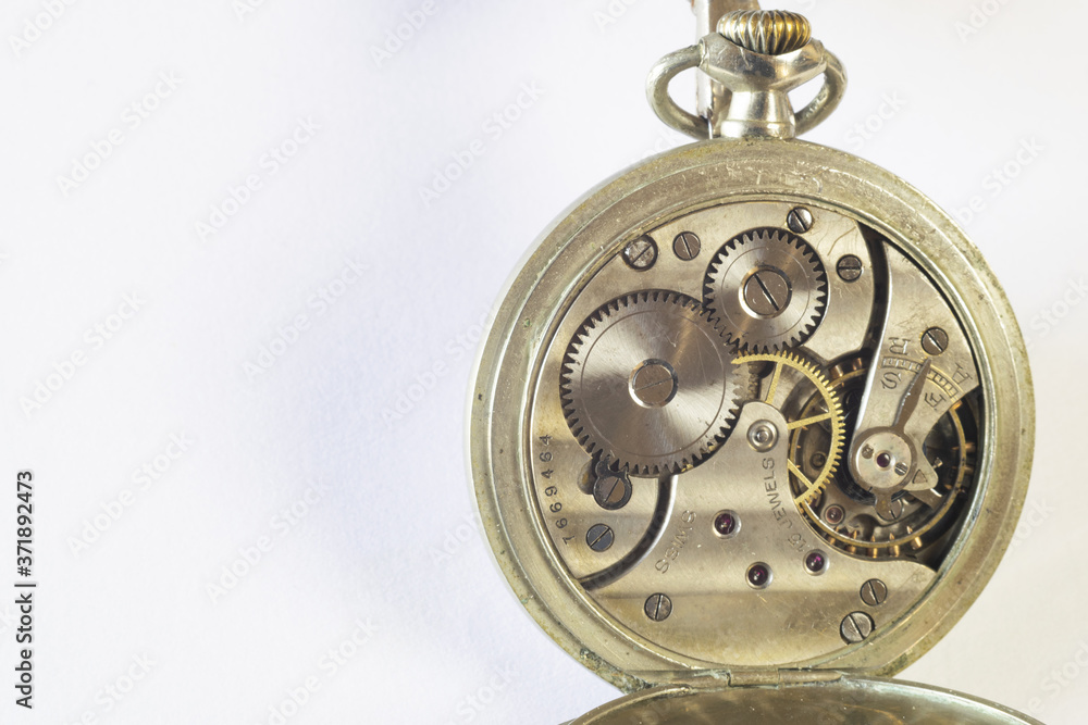 Old clock with machinery in sight