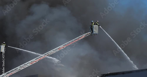 A factory burning, AiguesMortes, Occitanie, France photo