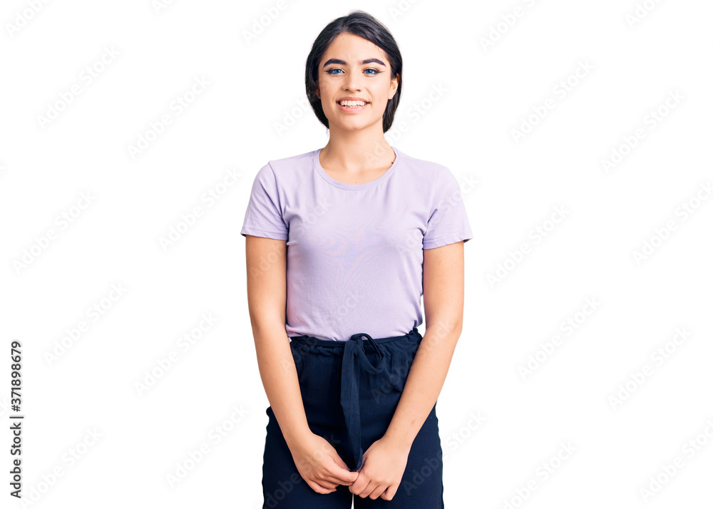 Brunette teenager girl wearing casual clothes with a happy and cool smile on face. lucky person.