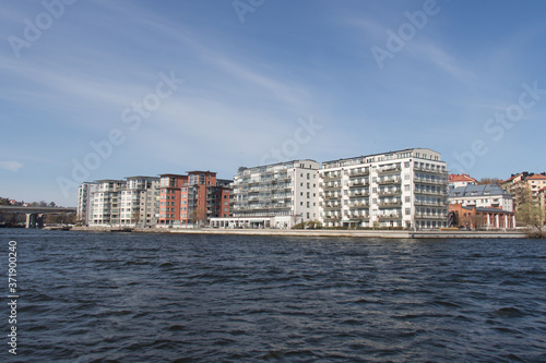 Stockholm, Sweden - April 21 2019: the view of colorful buildings on Kungsholmen waterfront in a sunny day on April 21 2019 in Stockholm Sweden.