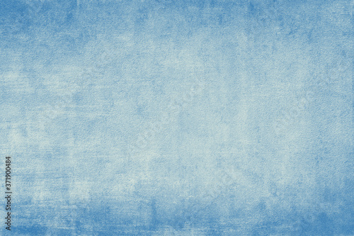 Abstract Old grunge texture background with blue color, Old vintage background with a glowing center and grunge