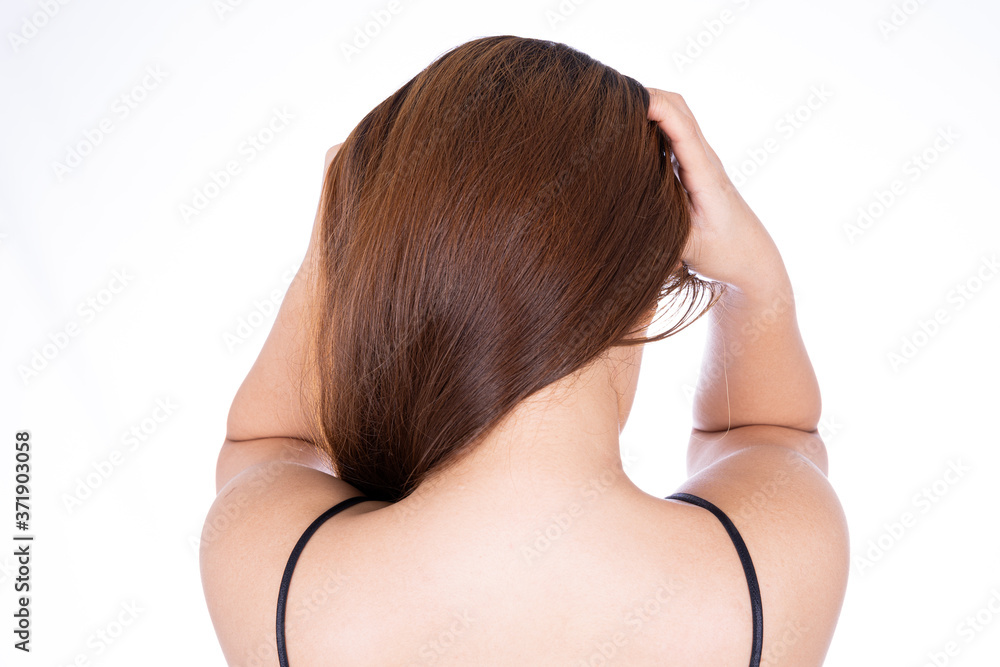 A woman feeling exhausted and suffering from neck and head pain and injury on isolated white background. Health care and medical concept. A woman feeling exhausted and suffering from neck and head pain and injury on isolated white background. Health care and medical concept.