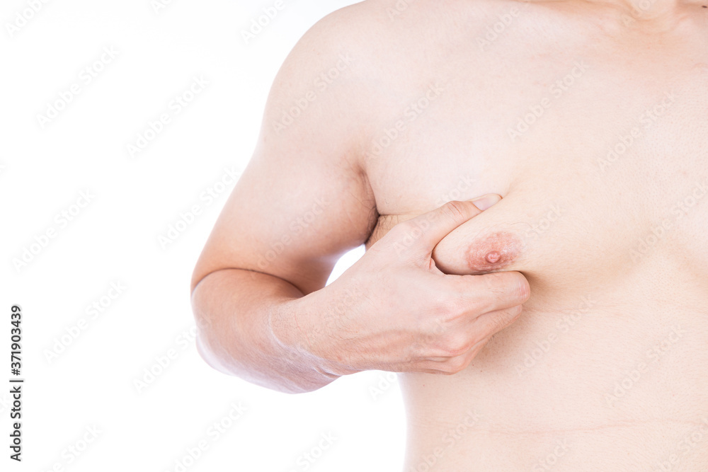 Close up man holding men boobs on white background. Diet, weight loss, slim body, healthy lifestyle concept. Close up man holding men boobs on white background. Diet, weight loss, slim body, healthy lifestyle concept.