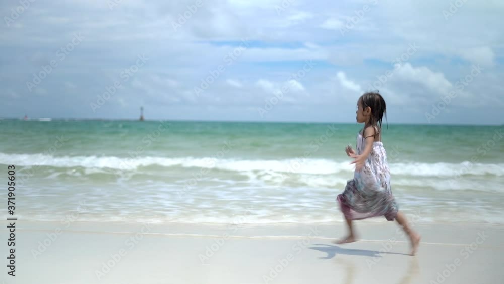Slow motion clips,A cute little girl playing in the sea, Koh Samed in Thailand. Slow motion clips,A cute little girl playing in the sea, Koh Samed in Thailand.