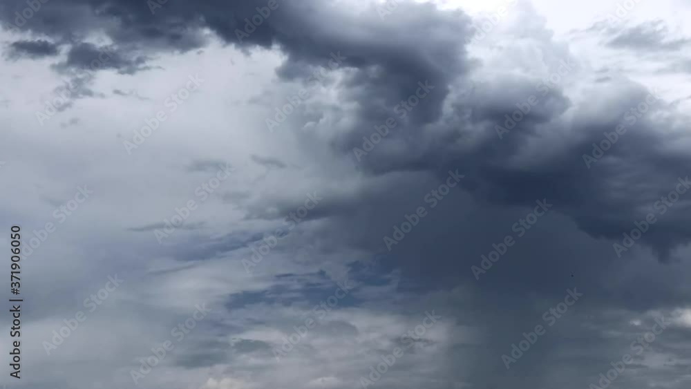 HD video time lapse of clouds blowing through a blue sky, dark storm clouds blowing through white fluffy and misty clouds.
HD video time lapse of clouds blowing through a blue sky, dark storm clouds blowing through white fluffy and misty clouds.