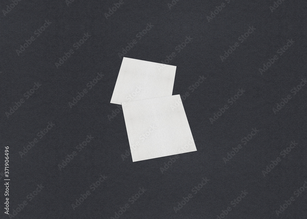 Blank white Business card mockup stacks on grey textured paper background. Blank white Business card mockup stacks on grey textured paper background.