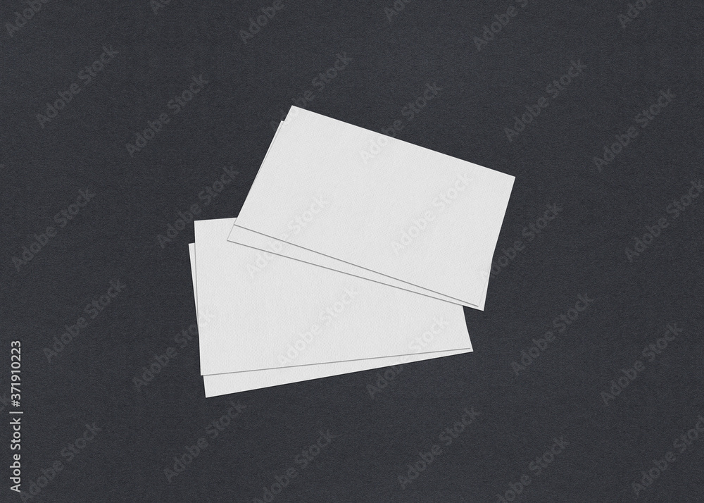 Blank white Business card mockup stacks on grey textured paper background. Blank white Business card mockup stacks on grey textured paper background.