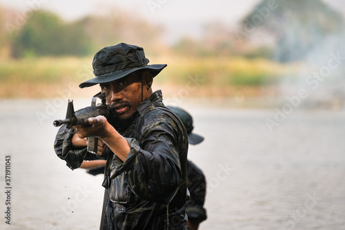 The rangers wade through the water to randomly shoot and attack.