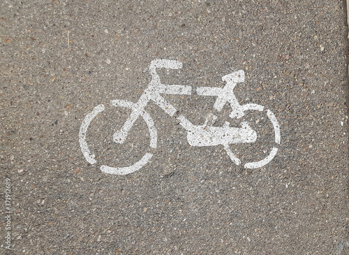 Bike lane in a city with bike lane icon