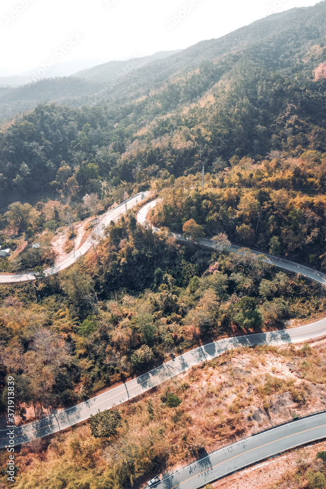 Fototapeta premium Winding up the mountain road