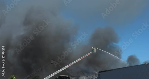 A factory burning, AiguesMortes, Occitanie, France photo